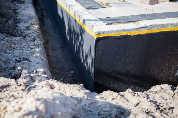 Professional Waterproofing technician working in Newaygo, MI